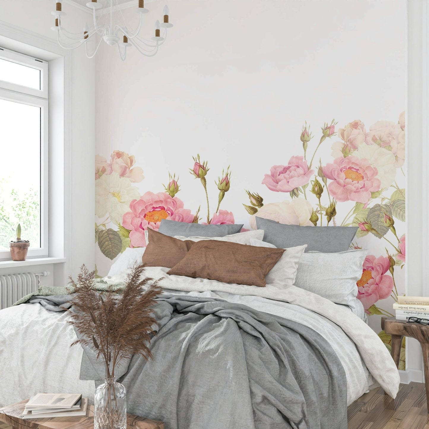 A close-up view of a wall mural featuring blush pink and cream roses.

