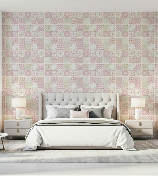 Vintage Folk Tiles Blush Pink wallpaper behind an upholstered headboard and white bed with twin lamps in a bedroom