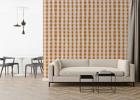 A classic gingham wallpaper pattern softened with textured brown and beige brushwork.
