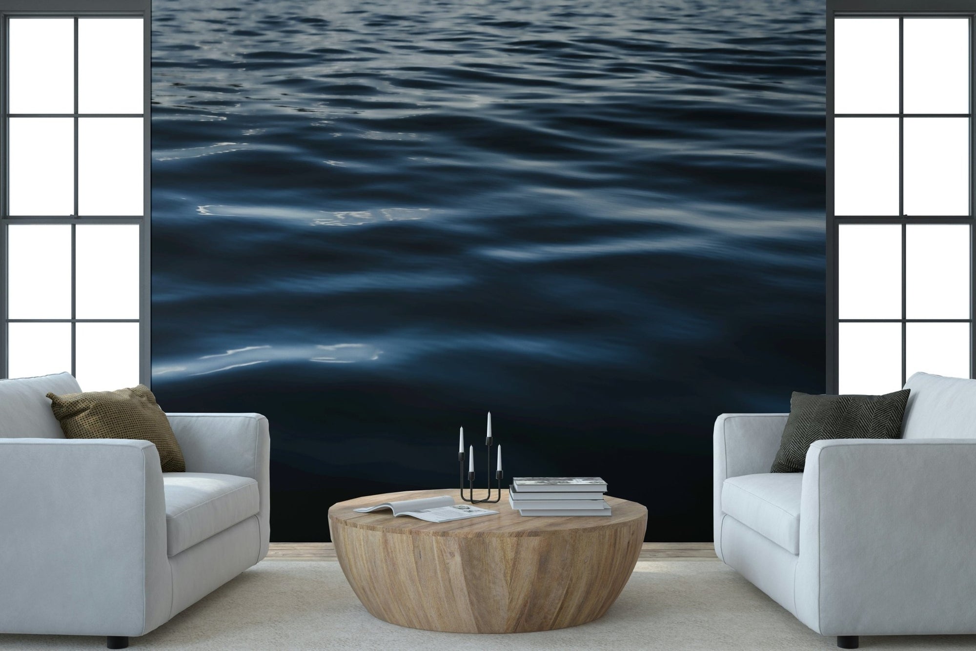 Water Ripples wallpaper mural of dark blue rippling water between two white armchairs in a living room