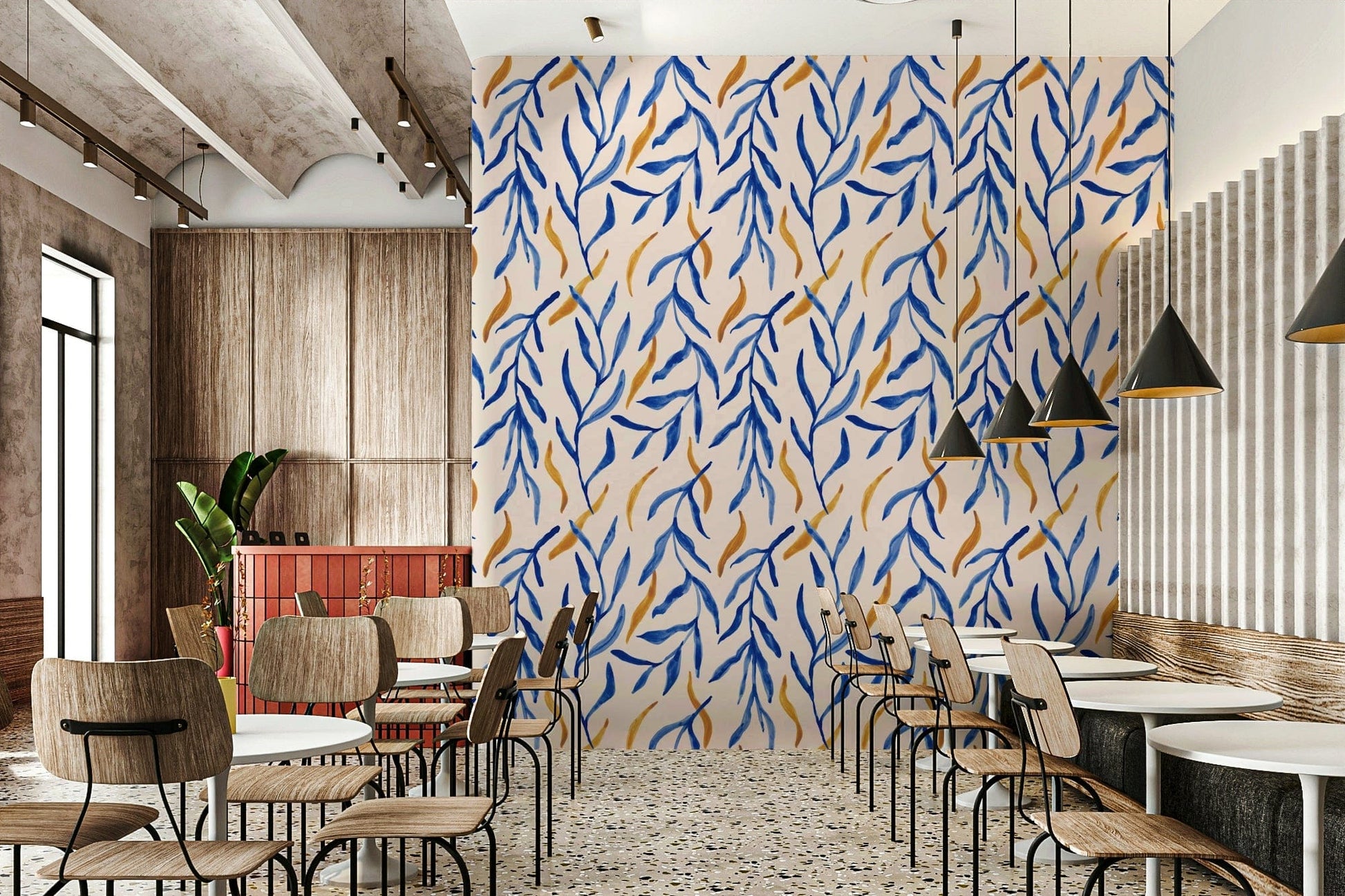 Watercolor botanical pattern with layered blue leaves and gold accents.