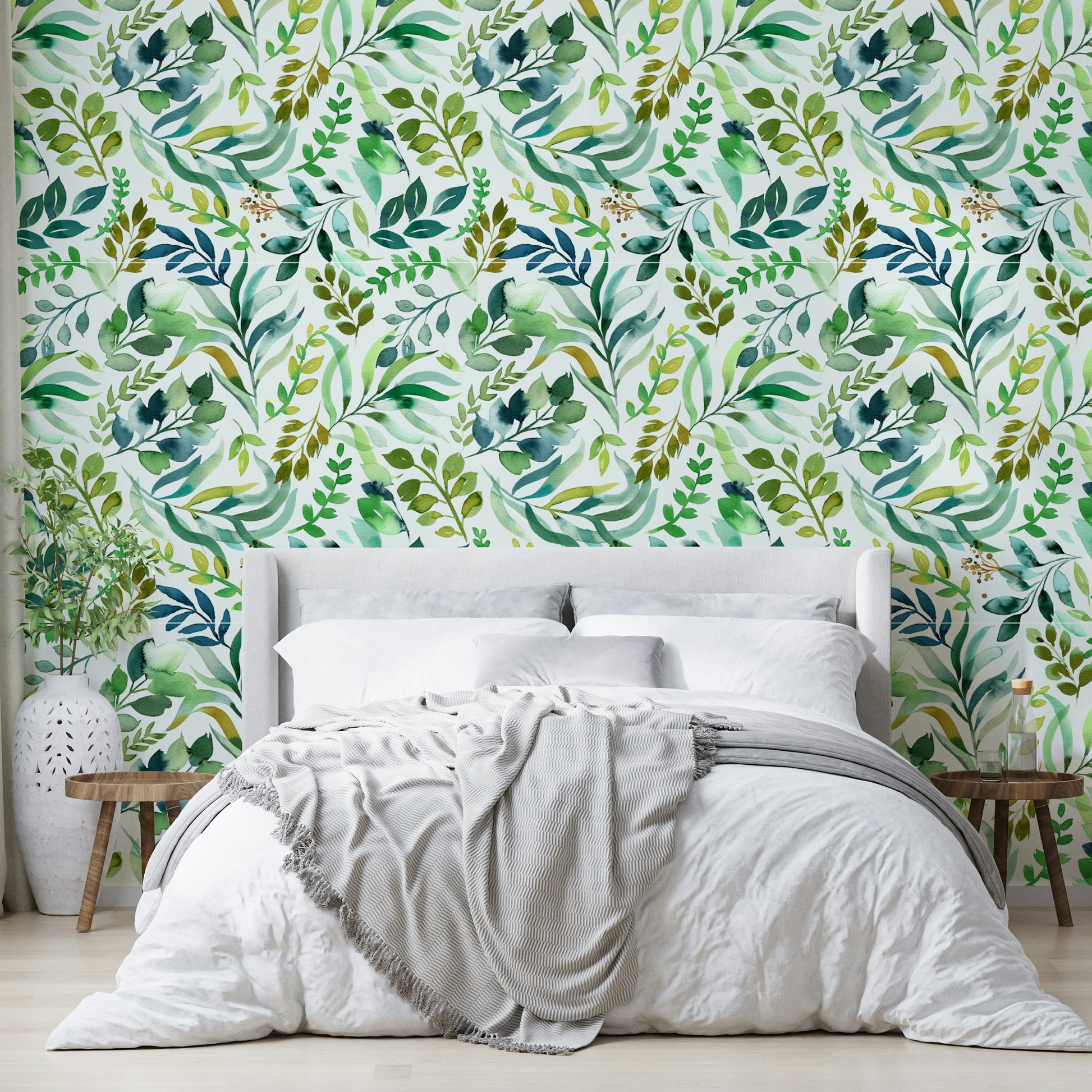 Light and airy leaf wallpaper in a botanical watercolor theme.

