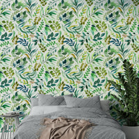 Hand-painted botanical wallpaper featuring delicate leaf designs.

