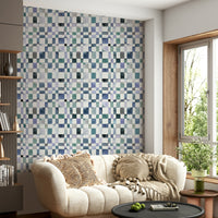 Geometric wallpaper featuring squares in calming blue tones.

