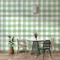 Light green check pattern mural with watercolor effects.

