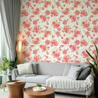 Watercolor floral pattern with coral roses and natural leaf accents.

