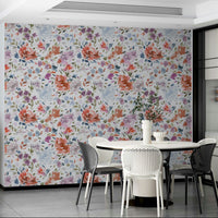 Floral wallpaper featuring watercolor roses in deep red and soft blue.

