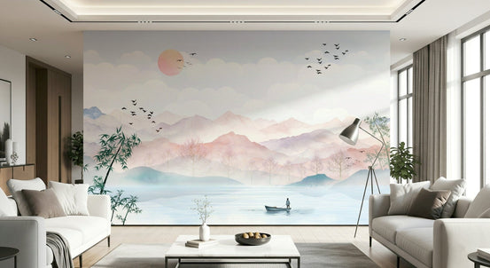 Watercolor Mountain Haze wall mural spanning a bright open lounge, its pink peaks and lakeside boat sitting between two pale sofas.