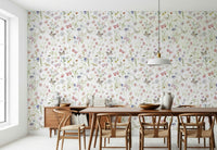 Colorful and intricate meadow pattern with soft pink and lavender watercolor flowers.