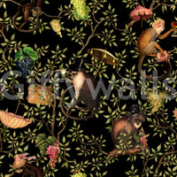 Playful wall mural with monkeys swinging through tropical vines.


