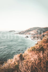 Big Sur coast view wall mural with dramatic cliffs and ocean.

