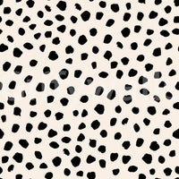 A seamless pattern of irregular dots on a wall


