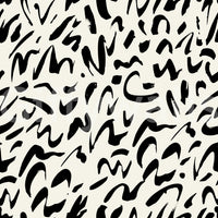 A seamless pattern of doodles on a wall

