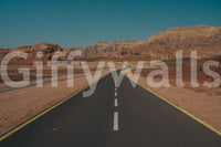 A detail of the warm tones in the desert and sky.


