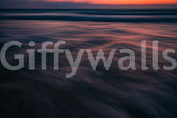 A detail of the warm tones in the water and sky.


