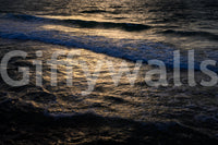 A detail of the warm tones in the rock and water.

