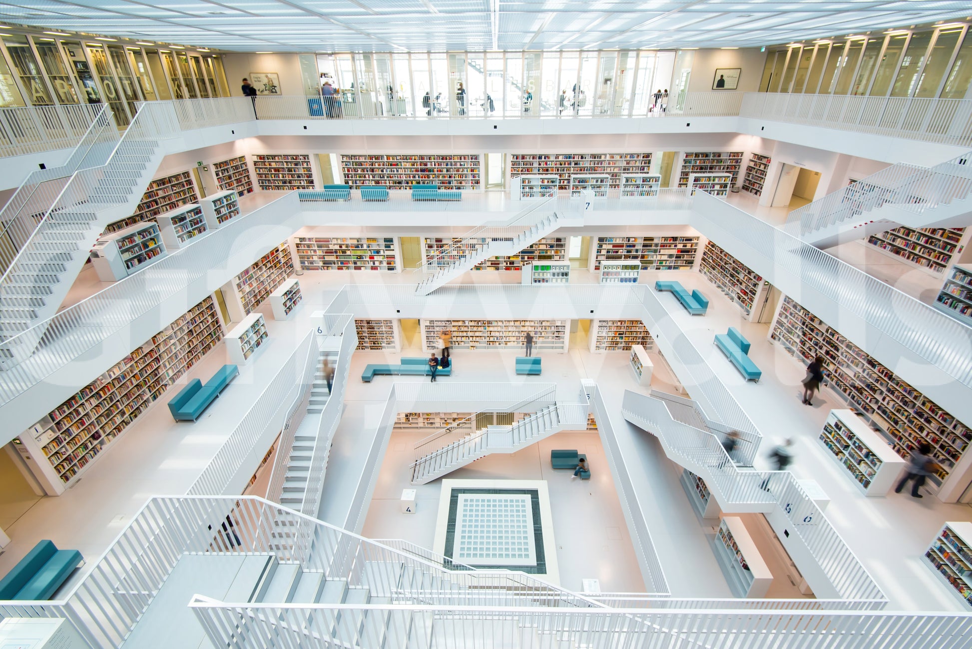 Library Labyrinth Wall Mural — immersive literary maze with bookshelves stretching into the distance.