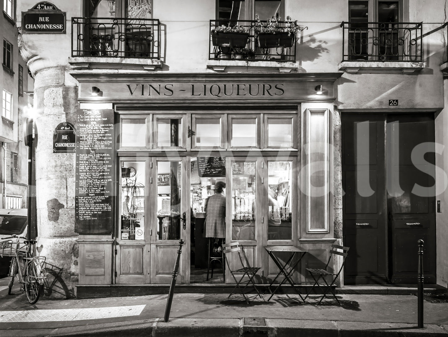 Retro street life depiction wallpaper, dark and moody atmosphere.