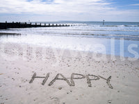 Joyful word etched Happy Beach wallpaper vast sandy expanse.