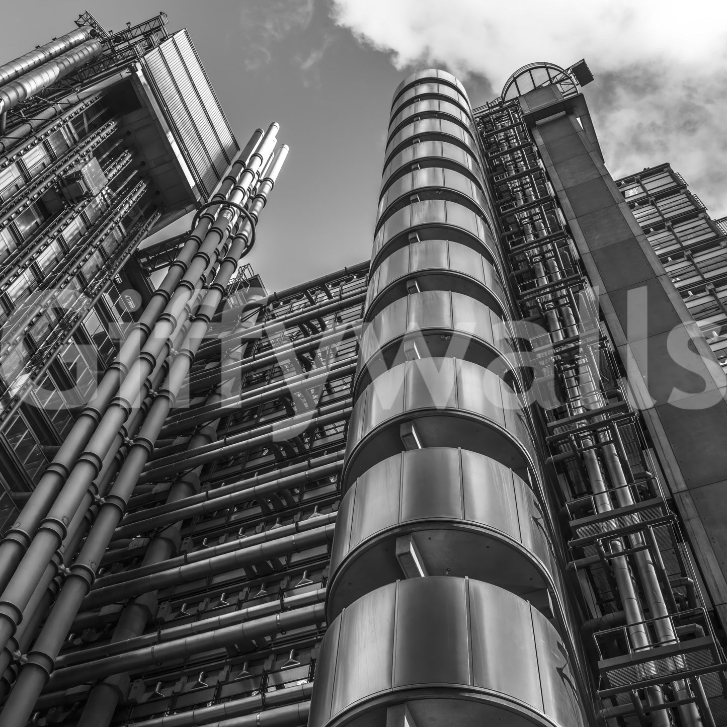 Lloyds building design, powerful urban statement piece, featuring massive steel cylinders.