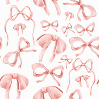 Adorable pink feminine ribbon wallpaper pattern.