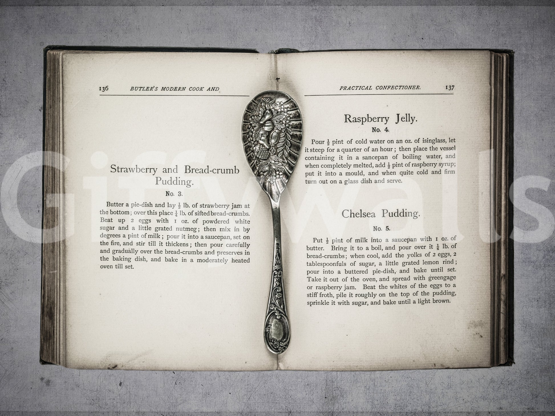 Culinary Antiques wall covering featuring worn book edges and silver details.