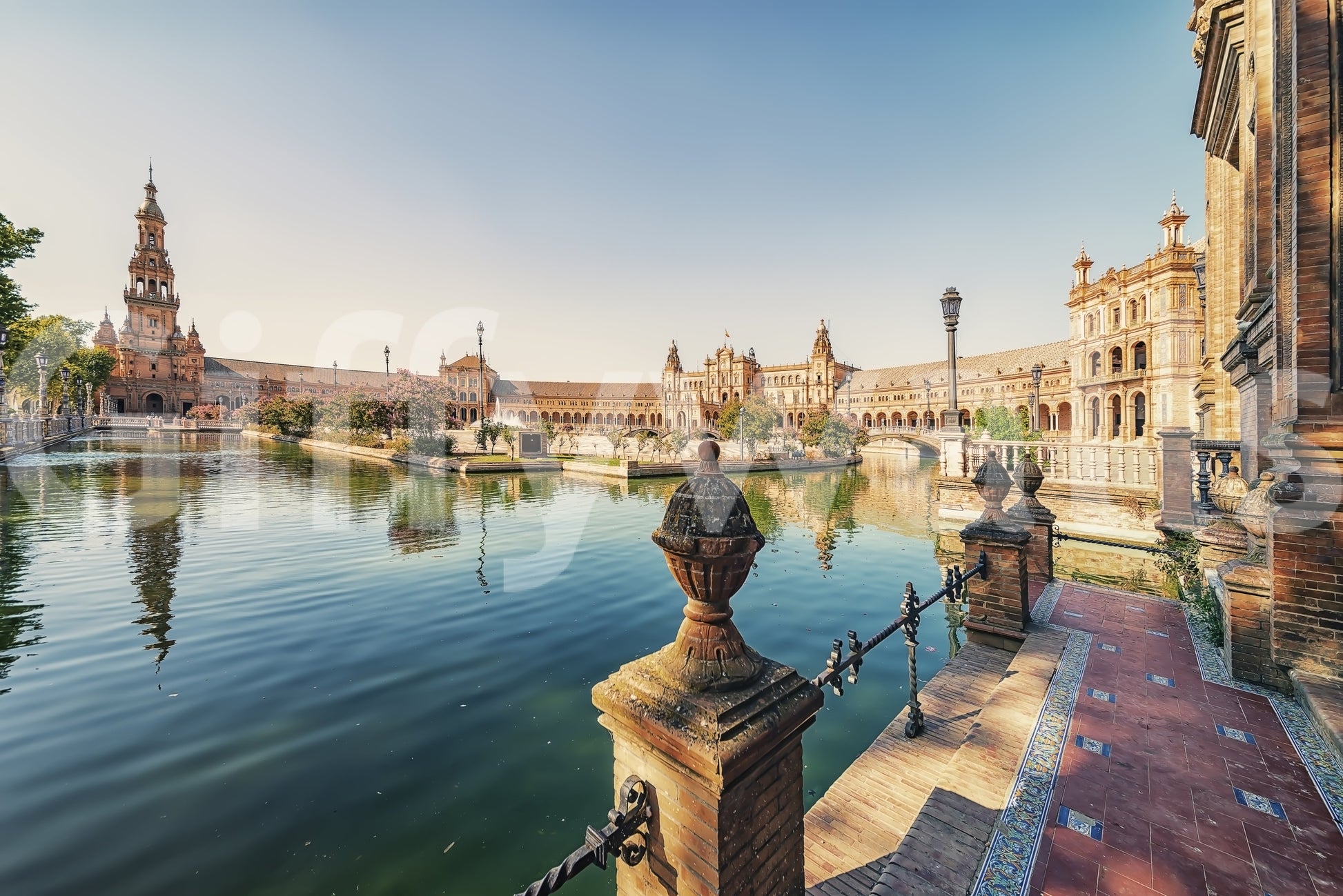 Ornate iron railings Seville Serenity wallpaper mural urban escape.
