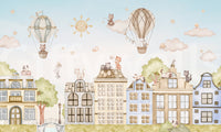 Cartoon city wall mural with cats, skyline, and light color palette