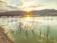 Wandbild Sonnenuntergangsreflexionen über ruhigem See