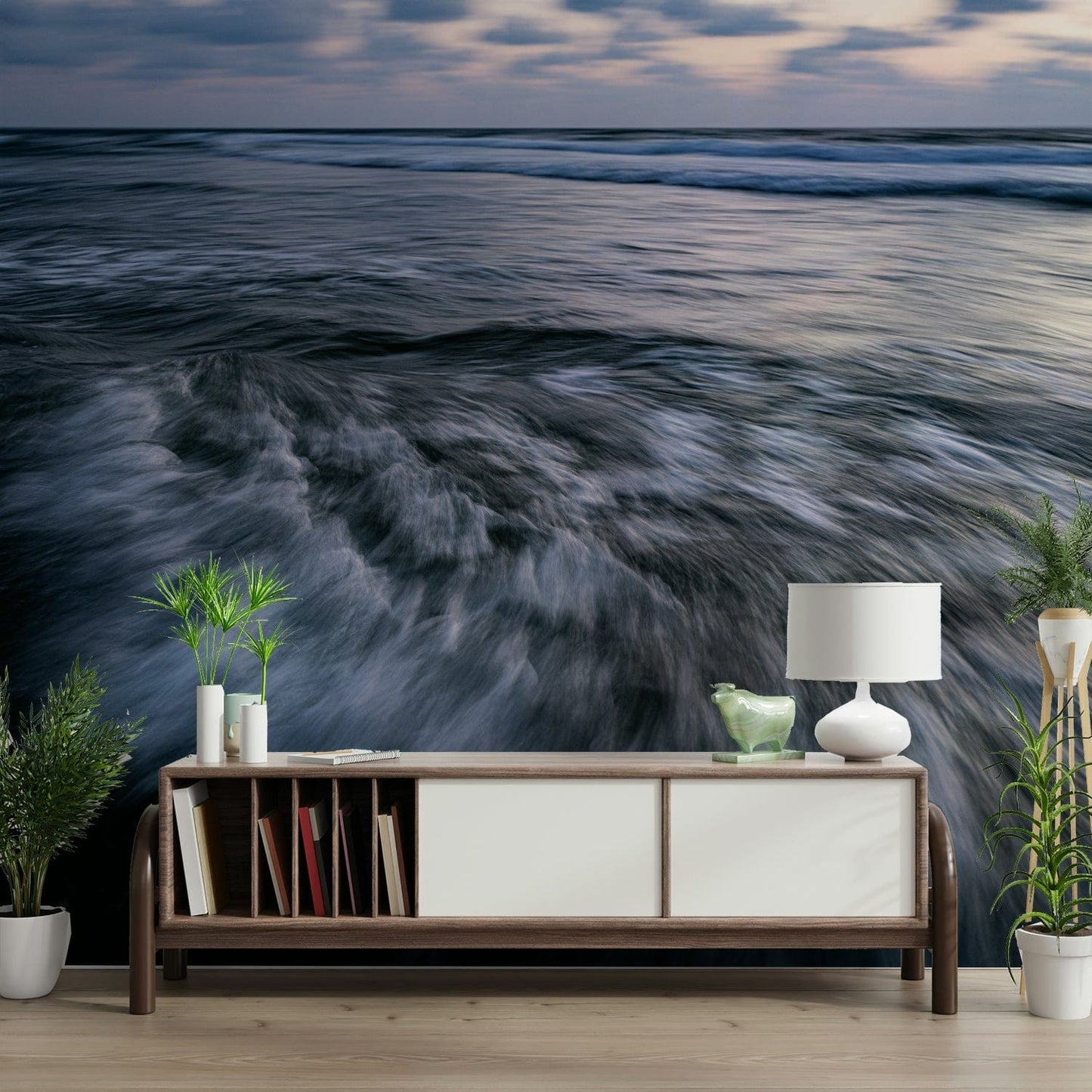 A contemporary living room with a large ocean wave wall mural.

