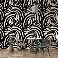 The mural is created for an entire wall, providing a unique backdrop.
