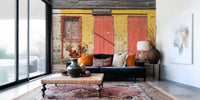 Exterior building view featuring a textured red door wall mural