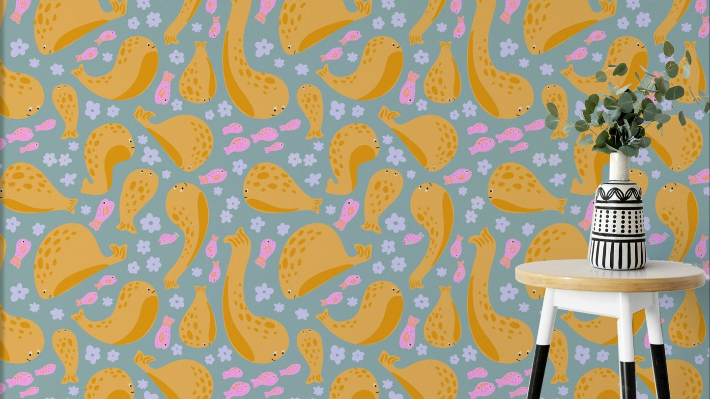 The image shows a pattern of playful whales.

