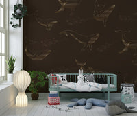 Large whale print in a bright apartment living room.