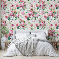 Whimsical wallpaper with soft, flowing watercolor rose designs.

