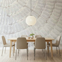 Textured wall mural with gentle, layered patterns creating a serene and sophisticated accent wall.