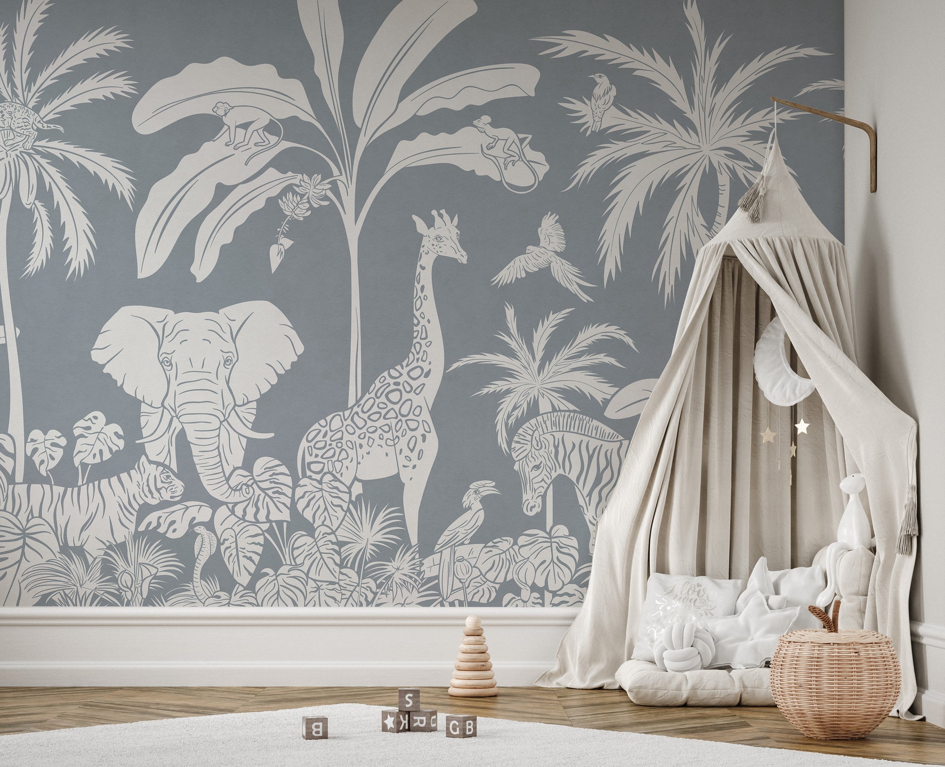 Monochrome Jungle Blue Wall Mural peel and stick version in a whimsical nursery featuring a white teepee tent.