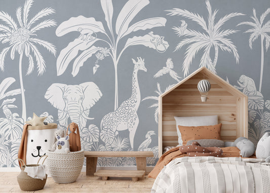 Monochrome Jungle Blue Wall Mural in a bedroom with a house bed and brown pillows using peel and stick material.