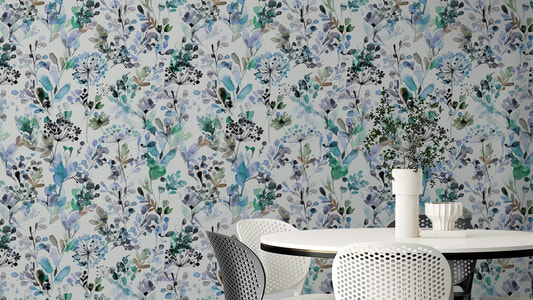 Wild Grasses Blue Wallpaper in a modern flat lounge with blue and grey furniture.