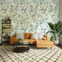 Botanical nature themed home décor in a master bedroom with soft grey textiles.