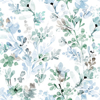 Calm meadow landscape wallpaper for a library or study with dark wood bookcases.