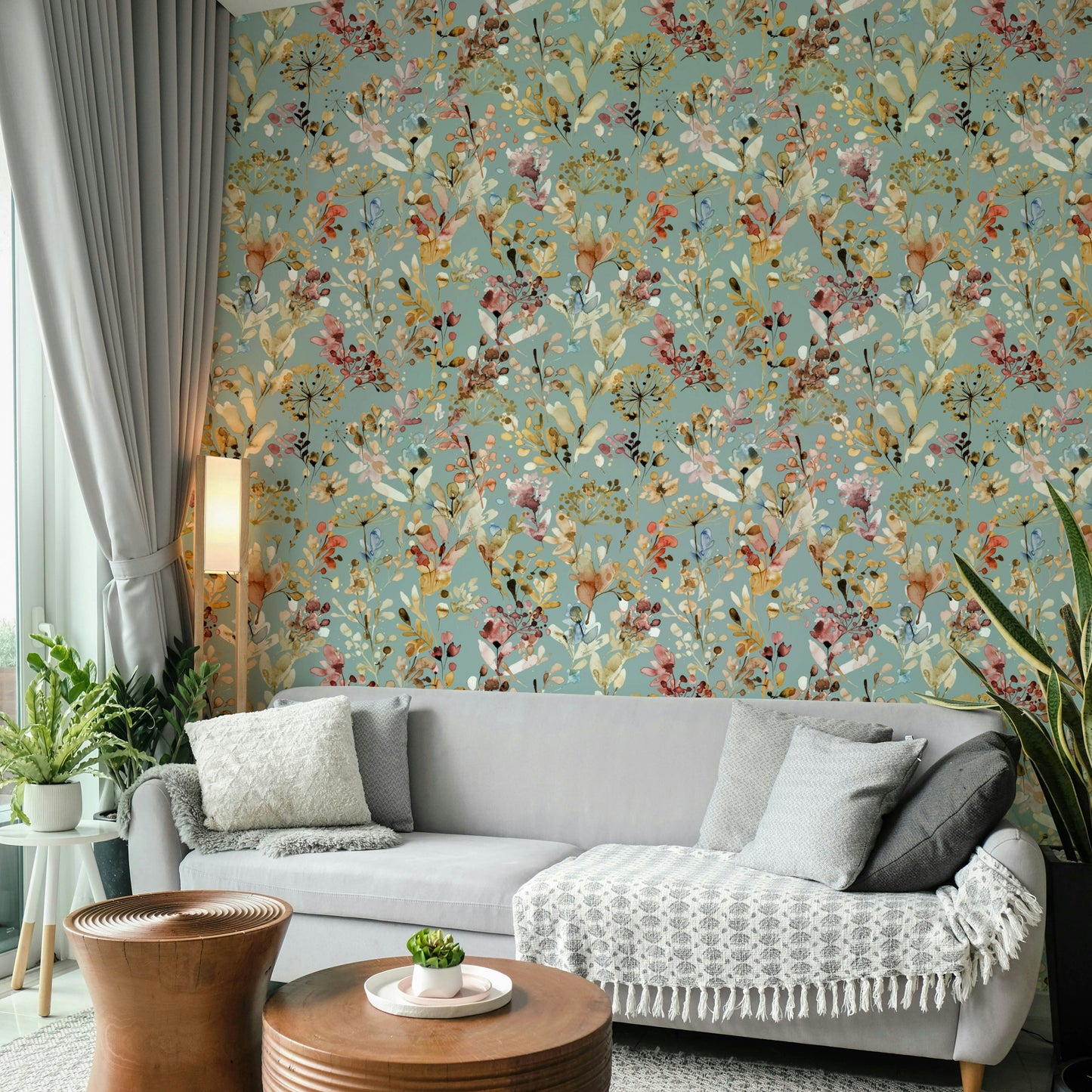 Bold teal meadow mural for a sophisticated studio workspace with velvet furniture.