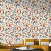 Botanical nature themed wall décor in a guest suite with soft wool throws.