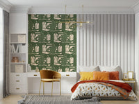 Wild West Charm wallpaper featuring cowboy boots, cacti, pistols, and stars on a rustic green background.