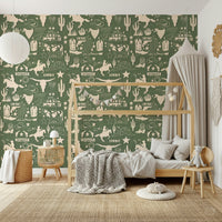 Cowboy-themed wallpaper mural with vintage-style western sketches on a warm green backdrop.