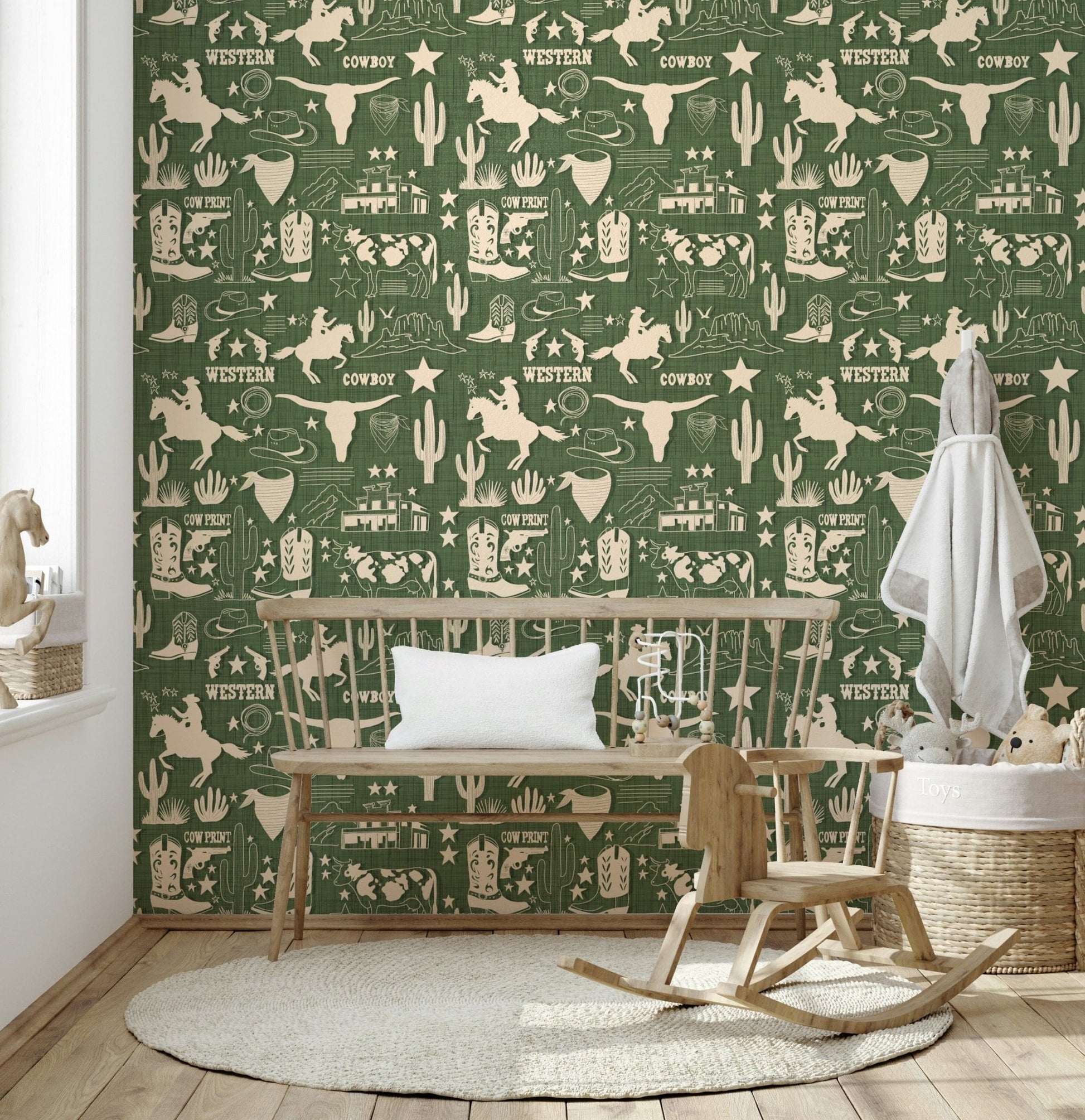 Wild West Sketch wallpaper featuring hand-drawn cowboy motifs, longhorns, and cacti on a textured green background.
