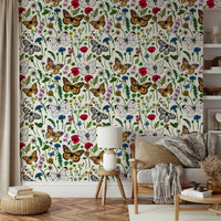 Bright floral wallpaper with wildflowers and fluttering butterflies

