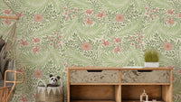 A wallpaper featuring a classic, intricate floral pattern.

