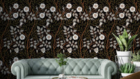 A wallpaper featuring a classic, intricate floral pattern.

