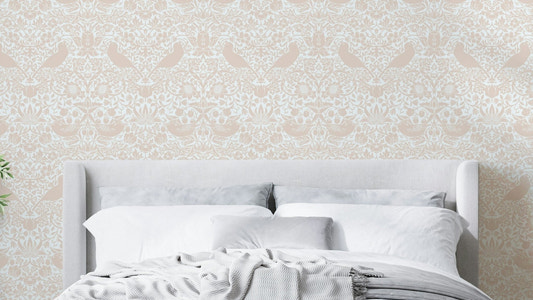 The colors are soft and neutral, with a dominant pink and white.


